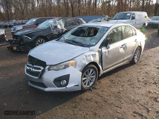 2012 Subaru Impreza Sedan 2.0i Premium with VIN JF1GJAC63CH012043, listed as a IAAI auction lot 41837527 with 112,398 mi miles. Bid and sale history available at carsss.com. Image 6.