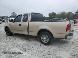 1999 Ford F-150 with VIN 1FTZX1721XNA37541, listed as a Copart auction lot 51588415 with 267,071 mi miles and Salvage title. Bid and sale history available at DreamBid. Image 2.