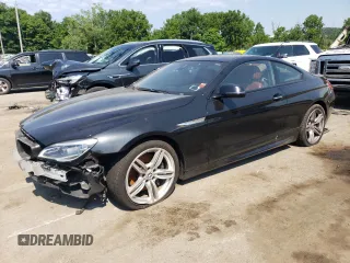 2017 BMW 6 Series z VIN WBA6H7C39HGA05251, wystawiony jako Copart lot #62760484 z przebiegiem 88 306 mil mil oraz Nie do naprawy • Non repairable. Historia ofert i sprzedaży dostępna na DreamBid. Obrazek 1.
