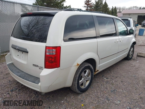 2010 Dodge Grand Caravan SXT with VIN 2D4RN5D17AR408112, listed as a IAAI auction lot 42128842 with 173,862 mi miles and . Bid and sale history available at DreamBid. Image 4.