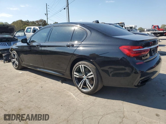 2019 BMW 7 Series 750i with VIN WBA7F0C56KGM25329, listed as a Copart auction lot 71613623 with 52,799 mi miles. Bid and sale history available at carsss.com. Image 2.