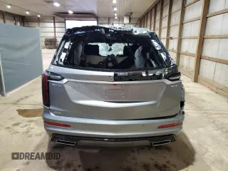 2023 Cadillac XT6 AWD Sport with VIN 1GYKPGRS5PZ121334, listed as a Copart auction lot 50606324 with 10,455 mi miles and Salvage Title. Bid and sale history available at carsss.com. Image 6.
