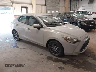 2019 Toyota Yaris Sedan L with VIN 3MYDLBYV2KY506668, listed as a IAAI auction lot 41337750 with 68,933 mi miles. Bid and sale history available at carsss.com. Image 1.