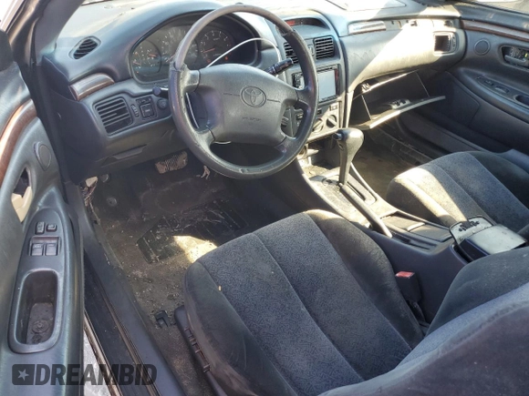 2000 Toyota Solara SE with VIN 2T1CF22P7YC263427, listed as a Copart auction lot 76457634 with Not Provided miles and Salvage Title. Bid and sale history available at DreamBid. Image 8.