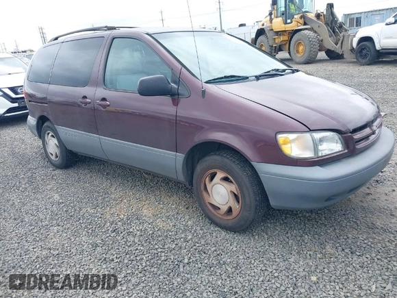 1999 Toyota Sienna LE with VIN 4T3ZF13C7XU152879, listed as a IAAI auction lot 41974953 with 201,644 mi miles. Bid and sale history available at carsss.com. Image 1.