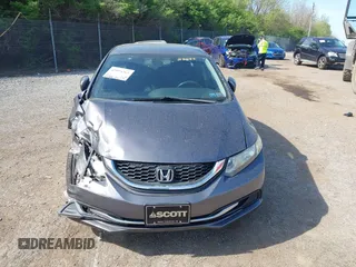 2014 Honda Civic LX with VIN 19XFB2F55EE234183, listed as a IAAI auction lot 42094263 with 148,728 mi miles. Bid and sale history available at carsss.com. Image 12.