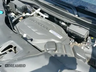 2019 Honda Pilot Touring 8-Passenger z VIN 5FNYF5H95KB010979, wystawiony jako IAAI lot #43285702 z przebiegiem 147 812 mil mil oraz . Historia ofert i sprzedaży dostępna na DreamBid. Obrazek 19.