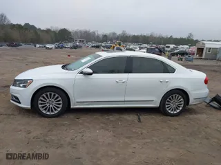 2016 Volkswagen Passat 1.8T SE w/Technology with VIN 1VWBS7A30GC013454, listed as a IAAI auction lot 41477109 with 134,027 mi miles. Bid and sale history available at carsss.com. Image 15.