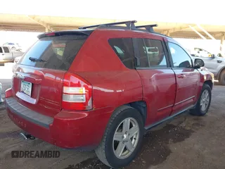 2010 Jeep Compass North Edition with VIN 1J4NF4FB2AD524890, listed as a IAAI auction lot 41842414 with 103,251 mi miles. Bid and sale history available at carsss.com. Image 4.