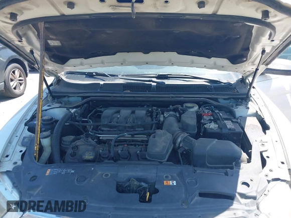 2013 Ford Taurus SEL with VIN 1FAHP2E83DG212029, listed as a IAAI auction lot 42020548 with 172,887 mi miles. Bid and sale history available at carsss.com. Image 10.