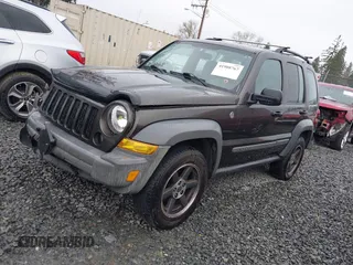 2005 Jeep Liberty Sport with VIN 1J4GL48K45W581892, listed as a IAAI auction lot 41908767 with 168,151 mi miles. Bid and sale history available at carsss.com. Image 2.
