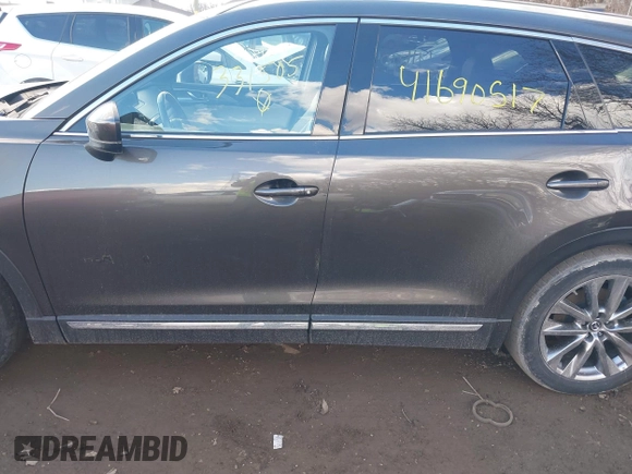 2019 Mazda CX-9 Grand Touring with VIN JM3TCBDY3K0331505, listed as a IAAI auction lot 41690517 with 64,520 mi miles. Bid and sale history available at carsss.com. Image 14.