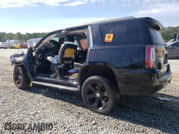 2015 GMC Yukon SLE with VIN 1GKS1AKC9FR740500, listed as a Copart auction lot 57010554 with 0 mi miles and Non Repairable. Bid and sale history available at carsss.com. Image 2.