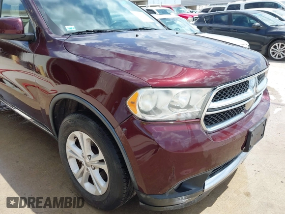 2012 Dodge Durango SXT with VIN 1C4RDHAG6CC301302, listed as a IAAI auction lot 42594428 with 134,495 mi miles and . Bid and sale history available at DreamBid. Image 6.
