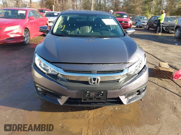 2017 Honda Civic Sedan EX-L with VIN 2HGFC1F70HH633263, listed as a IAAI auction lot 41511642 with 65,769 mi miles. Bid and sale history available at carsss.com. Image 12.
