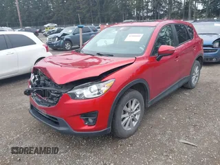 2016 Mazda CX-5 Touring with VIN JM3KE4CY2G0894930, listed as a IAAI auction lot 41906809 with 123,125 mi miles. Bid and sale history available at carsss.com. Image 17.