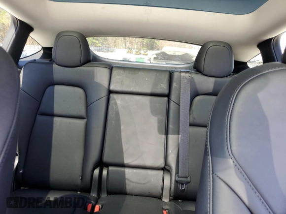 2025 Tesla Model Y Long Range with VIN 7SAYGAEEXSF253326, listed as a Copart auction lot 49527965 with 5,803 mi miles and Salvage Title. Bid and sale history available at DreamBid. Image 10.