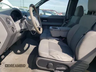 2007 Ford F-150 STX with VIN 1FTRX12W57FB31037, listed as a Copart auction lot 50779865 with 262,572 mi miles and Salvage Title. Bid and sale history available at DreamBid. Image 7.