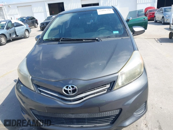 2012 Toyota Yaris L with VIN JTDKTUD38CD540219, listed as a IAAI auction lot 42091750 with 152,878 mi miles. Bid and sale history available at carsss.com. Image 12.