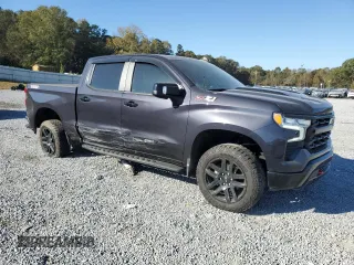 2022 Chevrolet Silverado 1500 LT Trail Boss with VIN 3GCUDFED2NG561825, listed as a Copart auction lot 77632284 with 34,448 mi miles and Salvage Title. Bid and sale history available at DreamBid. Image 4.