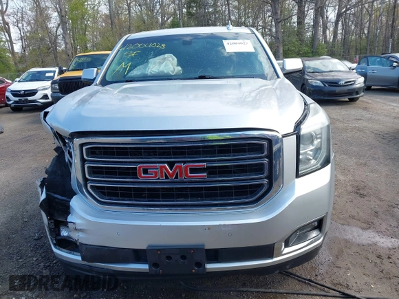 2015 GMC Yukon SLE with VIN 1GKS1AKC8FR540627, listed as a IAAI auction lot 42004023 with 128,195 mi miles. Bid and sale history available at carsss.com. Image 12.