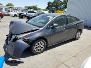 2017 Toyota Prius Two z VIN JTDKBRFU6H3579703, wystawiony jako Copart lot #59566345 z przebiegiem 238 380 mil mil oraz Szkoda całkowita • Salvage title. Historia ofert i sprzedaży dostępna na DreamBid. Obrazek 1.