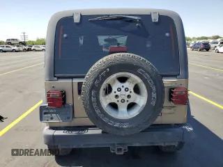 2003 Jeep Wrangler Sport z VIN 1J4FA49S43P327283, wystawiony jako Copart lot #59036295 z przebiegiem 158 108 mil mil oraz Szkoda całkowita • Salvage title. Historia ofert i sprzedaży dostępna na DreamBid. Obrazek 6.