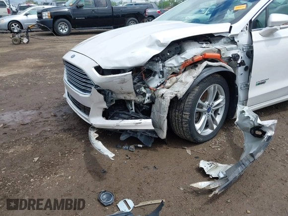 2016 Ford Fusion Titanium with VIN 3FA6P0SU5GR287017, listed as a IAAI auction lot 42316622 with 97,000 mi miles and . Bid and sale history available at DreamBid. Image 6.