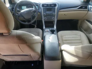 2018 Ford Fusion SE with VIN 3FA6P0H77JR188708, listed as a Copart auction lot 47030095 with 141,050 mi miles and Salvage Title. Bid and sale history available at DreamBid. Image 8.