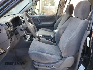 2003 Isuzu Rodeo with VIN 4S2CK58W334306303, listed as a Copart auction lot 83820444 with 180,040 mi miles and Salvage Title. Bid and sale history available at DreamBid. Image 7.