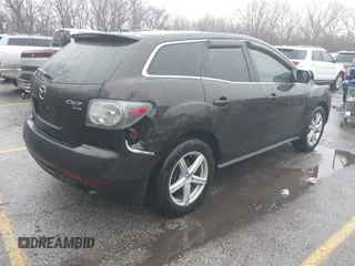 2010 Mazda CX-7 Grand Touring z VIN JM3ER4W32A0338657, wystawiony jako IAAI lot #41207462 z przebiegiem 257 713 mil mil oraz . Historia ofert i sprzedaży dostępna na DreamBid. Obrazek 4.