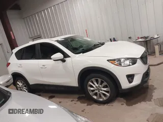 2014 Mazda CX-5 Grand Touring with VIN JM3KE4DY3E0374036, listed as a IAAI auction lot 41889030 with 162,611 mi miles and . Bid and sale history available at DreamBid. Image 13.