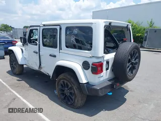 2024 Jeep Wrangler Sahara with VIN 1C4RJXP64RW270463, listed as a IAAI auction lot 42598295 with 36,251 mi miles and . Bid and sale history available at DreamBid. Image 3.