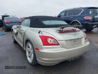 2006 Chrysler Crossfire Limited z VIN 1C3AN65L16X066010, wystawiony jako IAAI lot #41003432 z przebiegiem 95 926 mil mil oraz . Historia ofert i sprzedaży dostępna na DreamBid. Obrazek 3.