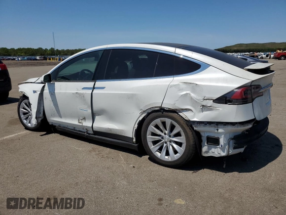 2016 Tesla Model X 70D z VIN 5YJXCAE26GF004233, wystawiony jako Copart lot #58378805 z przebiegiem 90 133 mil mil oraz Szkoda całkowita • Salvage title. Historia ofert i sprzedaży dostępna na DreamBid. Obrazek 2.