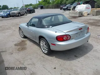 2002 Mazda MX-5 Miata Cloth with VIN JM1NB353420219700, listed as a IAAI auction lot 42510532 with 168,498 mi miles and . Bid and sale history available at DreamBid. Image 3.