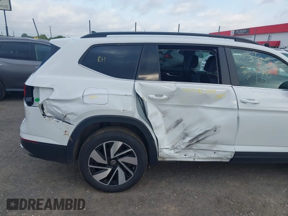 2025 Volkswagen Atlas SE with VIN 1V2HR2CAXSC505813, listed as a IAAI auction lot 42149407 with 19,160 mi miles and . Bid and sale history available at DreamBid. Image 6.