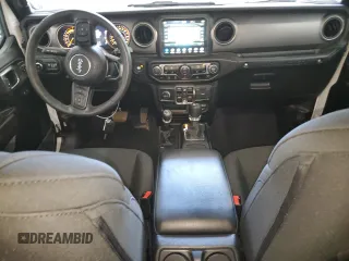 2022 Jeep Wrangler Unlimited Willys with VIN 1C4HJXDM0NW244953, listed as a Copart auction lot 71495154 with 14,577 mi miles and Salvage Title. Bid and sale history available at DreamBid. Image 8.