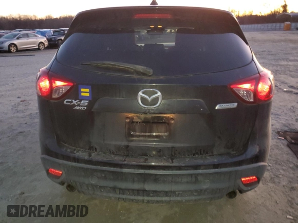 2014 Mazda CX-5 Grand Touring with VIN JM3KE4DY9E0366667, listed as a Copart auction lot 88707365 with 140,115 mi miles and Salvage Title. Bid and sale history available at carsss.com. Image 6.