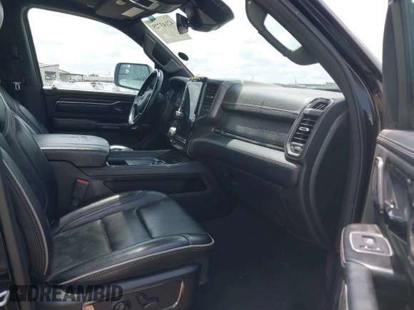 2023 Ram 1500 Limited with VIN 1C6SRFHT6PN541655, listed as a IAAI auction lot 42143725 with 52,793 mi miles and . Bid and sale history available at DreamBid. Image 5.
