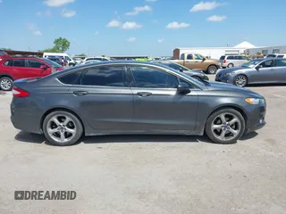 2016 Ford Fusion S z VIN 3FA6P0G78GR239353, wystawiony jako IAAI lot #42078032 z przebiegiem 177 367 mil mil oraz . Historia ofert i sprzedaży dostępna na DreamBid. Obrazek 13.
