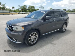 2014 Dodge Durango SXT with VIN 1C4RDHAG7EC380353, listed as a Copart auction lot 61053705 with 191,859 mi miles and Salvage title. Bid and sale history available at DreamBid. Image 1.