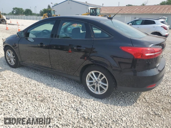 2016 Ford Focus SE with VIN 1FADP3F22GL233402, listed as a Copart auction lot 60854175 with 77,002 mi miles and Salvage title. Bid and sale history available at DreamBid. Image 2.