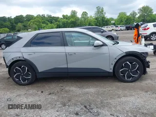 2022 Hyundai Ioniq 5 SEL z VIN KM8KNDAF0NU055189, wystawiony jako IAAI lot #42390538 z przebiegiem 37 542 mil mil oraz . Historia ofert i sprzedaży dostępna na DreamBid. Obrazek 13.