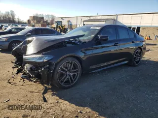 2022 BMW M5 z VIN WBS83CH05NCL02768, wystawiony jako Copart lot #85566424 z przebiegiem Nie podano mil oraz Szkoda całkowita • Salvage title. Historia ofert i sprzedaży dostępna na DreamBid. Obrazek 1.