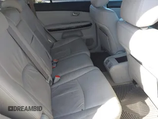 2008 Lexus RX with VIN 2T2HK31U08C053634, listed as a IAAI auction lot 42061737 with 306,854 mi miles. Bid and sale history available at carsss.com. Image 8.