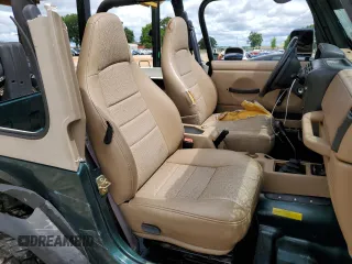 1999 Jeep Wrangler Sport with VIN 1J4FY19S0XP402688, listed as a Copart auction lot 58968125 with 211,910 mi miles and Salvage title. Bid and sale history available at DreamBid. Image 10.