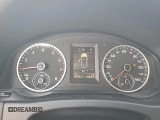 2012 Volkswagen Tiguan SE z VIN WVGAV7AX0CW509206, wystawiony jako Copart lot #52226395 z przebiegiem 108 922 mil mil oraz Szkody całkowita. Historia ofert i sprzedaży dostępna na DreamBid. Obrazek 9.