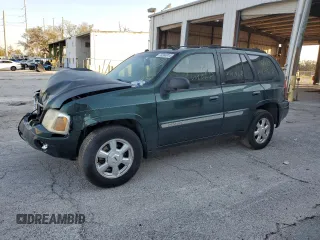 2005 GMC Envoy SLT with VIN 1GKDS13S652329610, listed as a Copart auction lot 76384914 with Not Provided miles and Salvage Title. Bid and sale history available at DreamBid. Image 1.