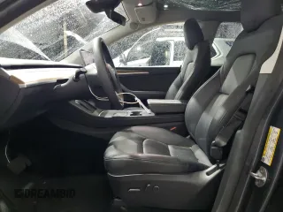 2023 Tesla Model Y Long Range z VIN 7SAYGDEE8PF814874, wystawiony jako Copart lot #56546365 z przebiegiem 20 919 mil mil oraz Szkoda całkowita • Salvage title. Historia ofert i sprzedaży dostępna na DreamBid. Obrazek 7.